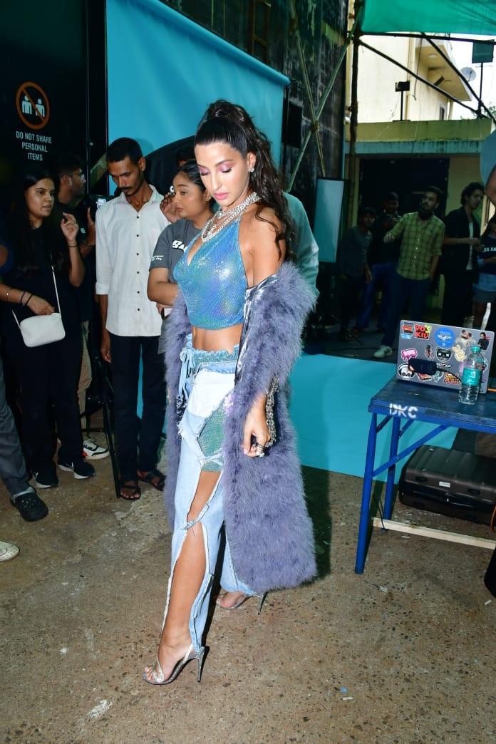 She looked gorgeous in her chic blue glittery top and blue jeans. She took casual and glam and effortlessly carried it with confidence
